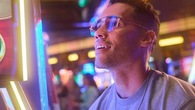 man at slot machine