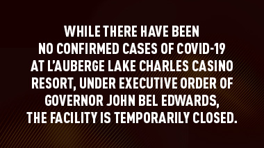 brown background with text "While there have been no confirmed cases of COVID-19 at L