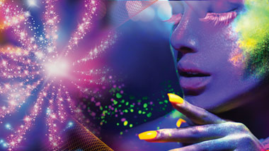 woman with glow paint and psychedelic background