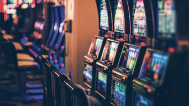 bank of slot machines in casino