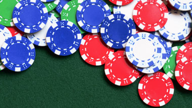 casino chips spread across felt